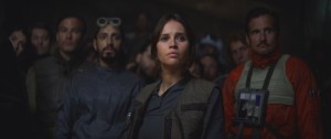 Rogue One: A Star Wars StoryJyn Erso (Felicity Jones) in foreground, Bodhi Rook (Riz Ahmed) in backgroundPh: Film FrameCopyright 2016 Industrial Light & Magic, a division of Lucasfilm Entertainment Company Ltd., All Rights Reserved